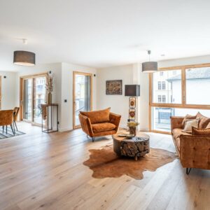 La pièce de vie de l'appartement 4 pièces dans la résidence OPUS à Annecy.