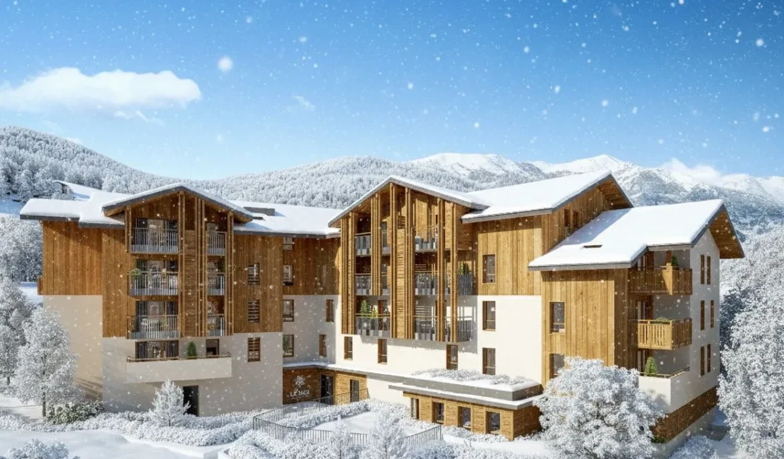 Perspective de la résidence LE KOS, à Saint-Jean-de-Sixt, en hiver sous la neige.